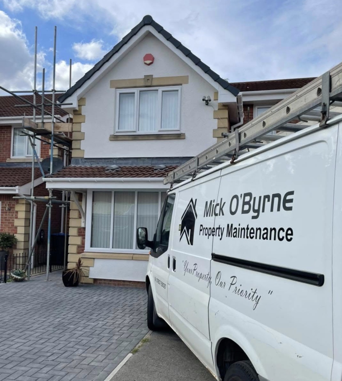 Aligned guttering and downpipes installed